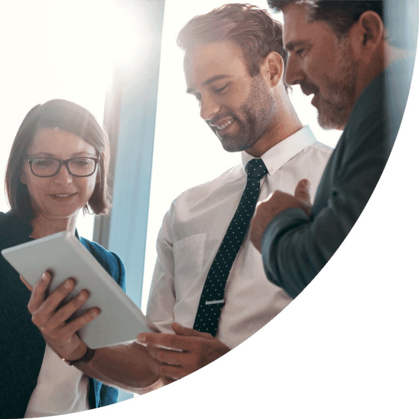 Business partners reviewing a new filing together on a tablet